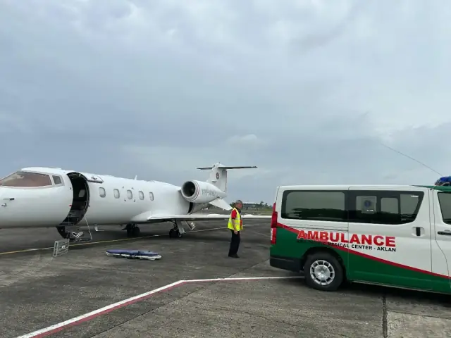 Red Dot Air Ambulance flight crew preparing the medical jet for a mission